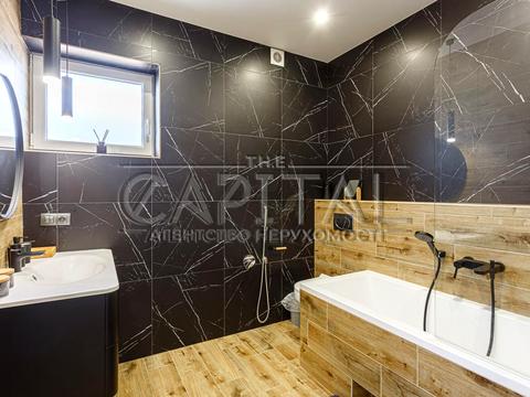 будинок за адресою с. Крюківщина, Георгія Мальцева, 1