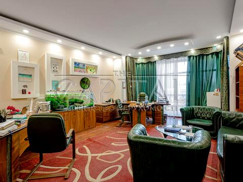 комерційна за адресою Євгена Коновальця вул. (Щорса), 32-Б