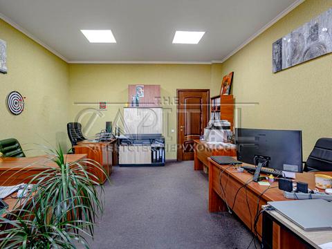 комерційна за адресою Євгена Коновальця вул. (Щорса), 32-Б