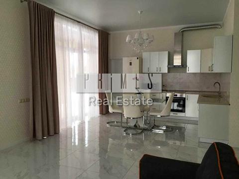 будинок за адресою Набережна вул.