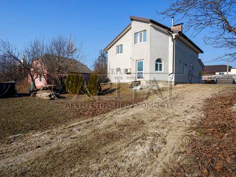 будинок за адресою с. Великі Дмитровичі, Тиханська вул., 11