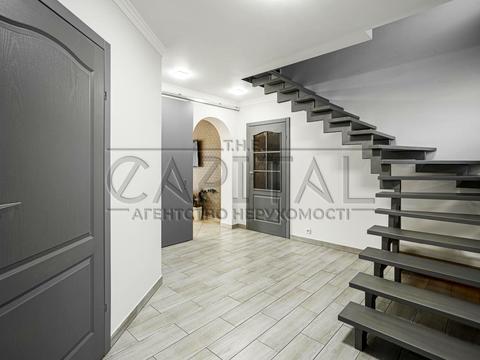 будинок за адресою с. Великі Дмитровичі, Тиханська вул., 11