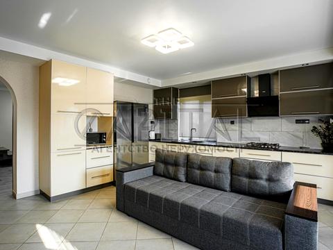 будинок за адресою с. Великі Дмитровичі, Тиханська вул., 11