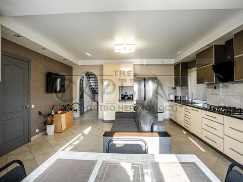 будинок за адресою с. Великі Дмитровичі, Тиханська вул., 11