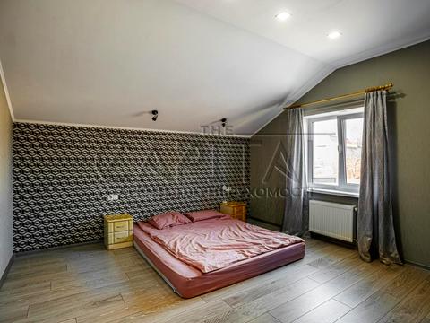 будинок за адресою с. Великі Дмитровичі, Тиханська вул., 11