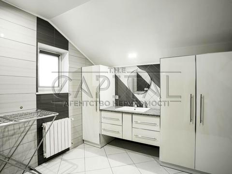 будинок за адресою с. Великі Дмитровичі, Тиханська вул., 11