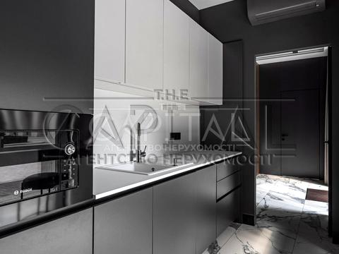 комерційна за адресою Бульварно-Кудрявська вул. (Воровського), 15а