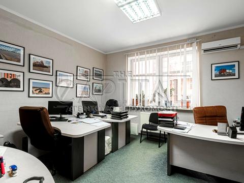 комерційна за адресою Євгена Коновальця вул. (Щорса), 32-Б