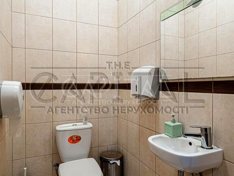 комерційна за адресою Євгена Коновальця вул. (Щорса), 32-Б