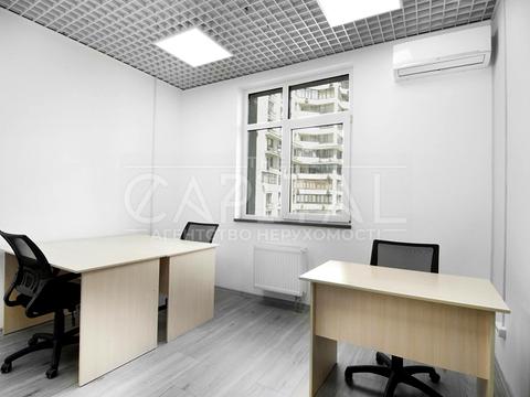 комерційна за адресою Євгена Коновальця вул. (Щорса), 44-А