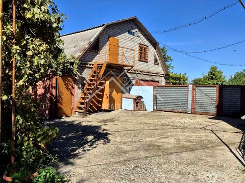 будинок за адресою с. Новоіванівка, Родини Харченків, 70