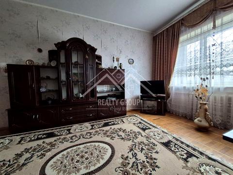 будинок за адресою с. Новоіванівка, Родини Харченків, 70