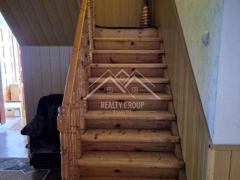 будинок за адресою с. Новоіванівка, Родини Харченків, 70