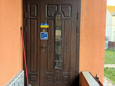 будинок за адресою Олега Ольжича вул. (Івана Лобачевського), 15