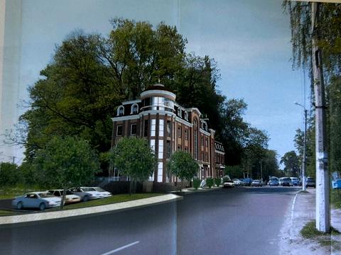 комерційна за адресою Жовтнева вул., 7