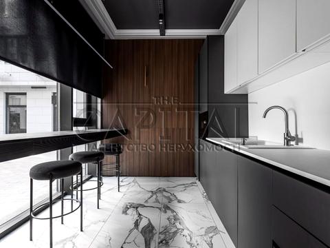 комерційна за адресою Бульварно-Кудрявська вул. (Воровського), 15