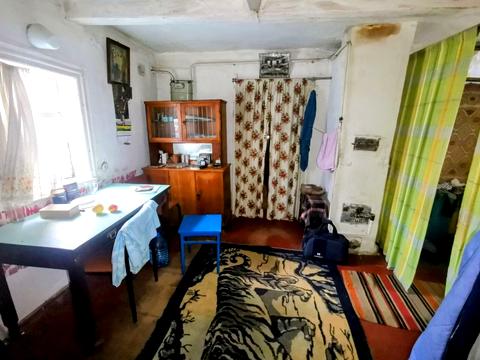 будинок за адресою с. Кривошиїнці, ковалівка 2