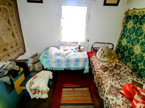 будинок за адресою с. Кривошиїнці, ковалівка 2