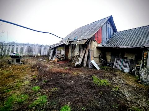 будинок за адресою с. Кривошиїнці, ковалівка 2