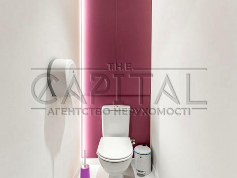 комерційна за адресою Євгена Коновальця вул. (Щорса), 34-А