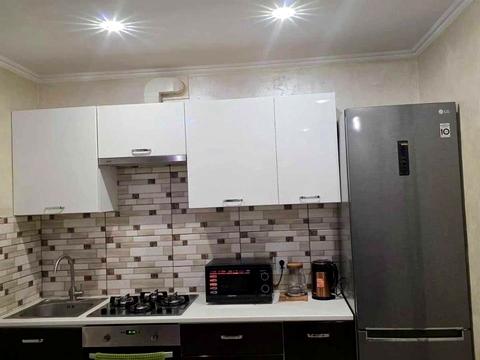 дом по адресу Коновальця