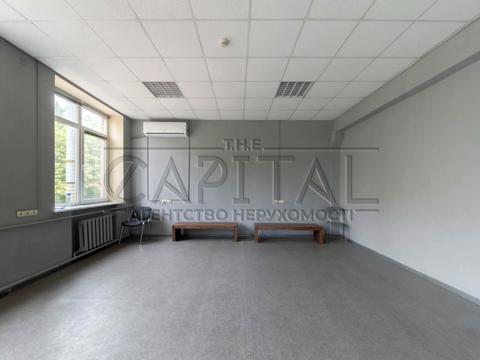 комерційна за адресою Євгена Коновальця вул. (Щорса), 31