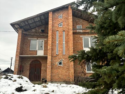 дом по адресу Хмельницького