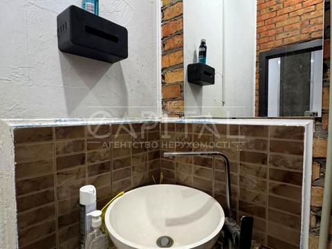 комерційна за адресою Євгена Коновальця вул. (Щорса), 36-Д