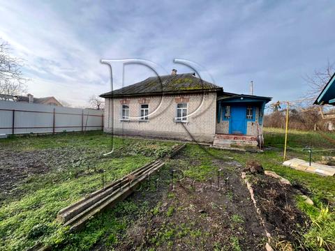 дом по адресу с. Пуховка, Дубрівська вулиця