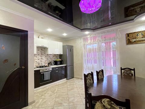 будинок за адресою Коновальця