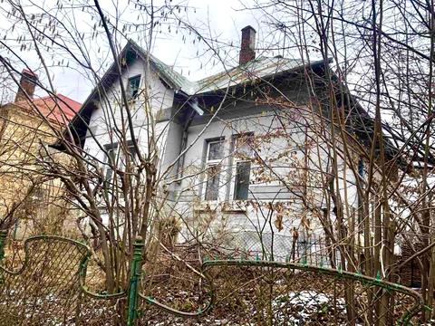 будинок за адресою Академіка Степана Рудницького вул.