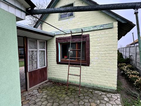 будинок за адресою смт. Обухівка, Ленина