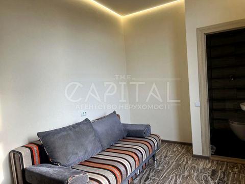 будинок за адресою Маланюка Євгена, 26