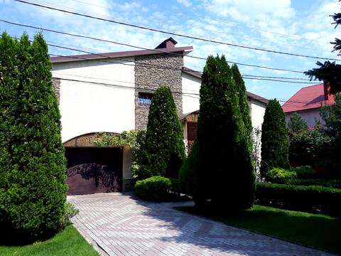 будинок за адресою Тополина