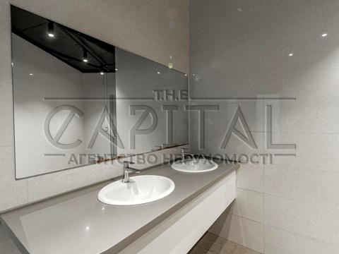 комерційна за адресою Євгена Коновальця вул. (Щорса), 36-В