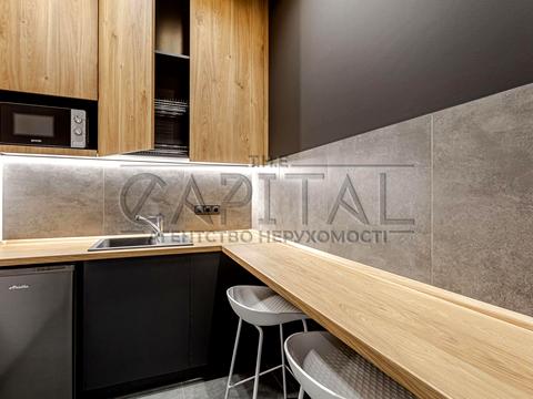 комерційна за адресою Михайла Бойчука вул. (Кіквідзе), 41-43