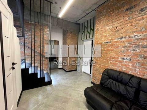 комерційна за адресою Євгена Коновальця вул. (Щорса), 44-А