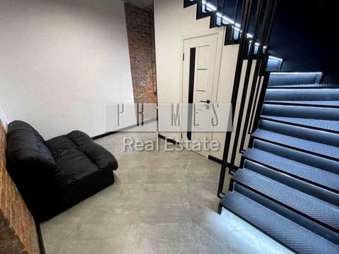 комерційна за адресою Євгена Коновальця вул. (Щорса), 44-А