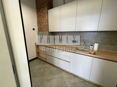 комерційна за адресою Євгена Коновальця вул. (Щорса), 44-А