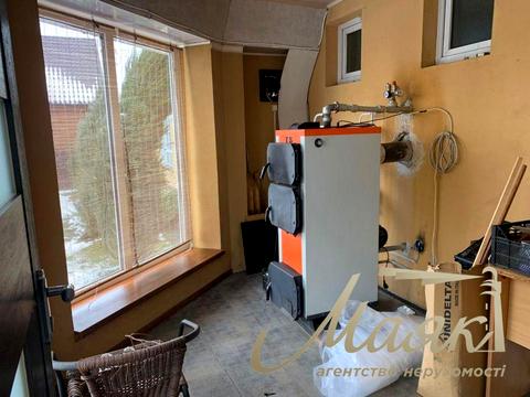 будинок за адресою с. Козин, нова