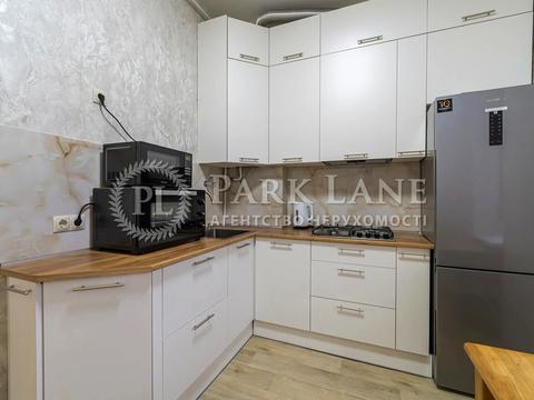 квартира за адресою Євгена Коновальця вул. (Щорса), 18