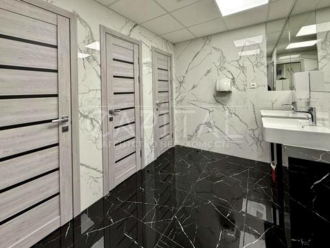 комерційна за адресою Шовковична вул., 42-44