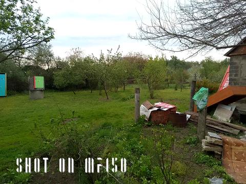 участок по адресу Мельниківська