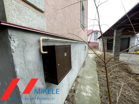 будинок за адресою смт. Козин, 2 лінія, 1