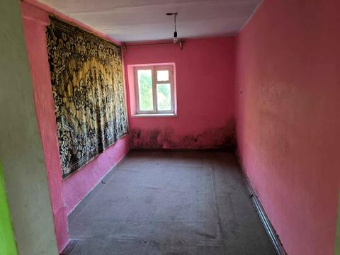 будинок за адресою с. Кузьменка, Центральна