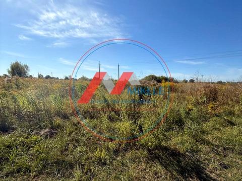 участок по адресу Комсомольська