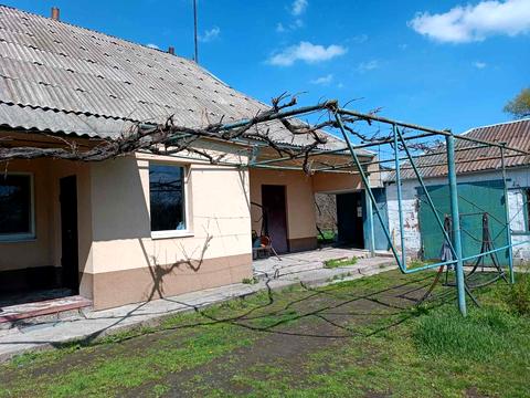 будинок за адресою с. Мишурин Ріг, Набережна