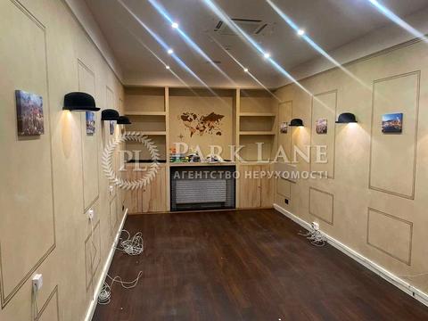 комерційна за адресою Євгена Коновальця вул. (Щорса), 12