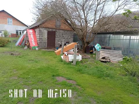 участок по адресу Мельниківська