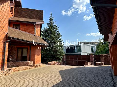 будинок за адресою смт. Козин, Андріївська, 31а